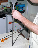 Filling desiccant in spacers in sealed double glazing