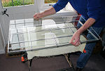 Reassembly of sealed double glazing unit - top pane