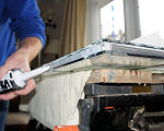 Re-sealing double glazing unit manually